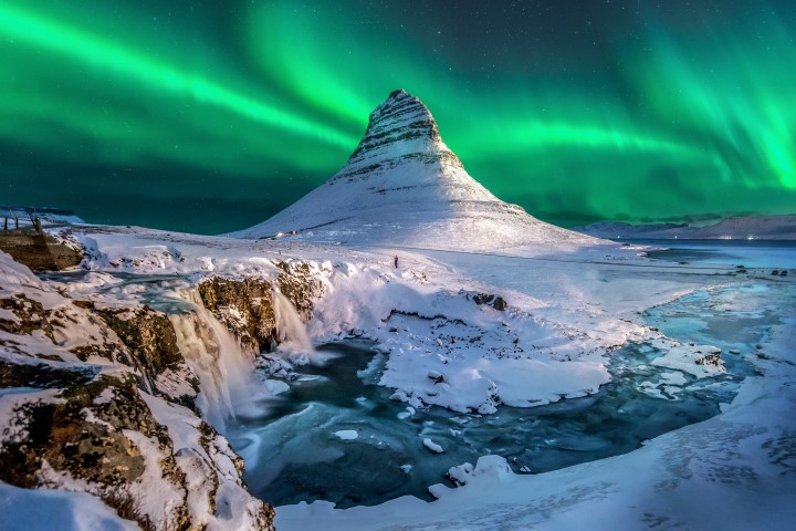 Northern Lights dancing over Kirkjufell Mountain